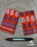 Fiery Orange Semi Pat Mekhela Sador with Vibrant Festive Spirit