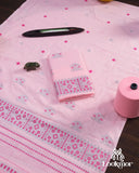 Delicate Pink Cotton Kesapaat Mekhela Sador Set in Floral Motif with Graceful Jura Pairing