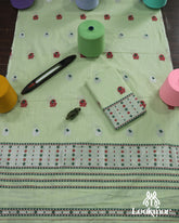 Graceful Green Cotton Kesapaat Set Mekhela Sador Paired with Stylish Jura